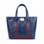 Wearsos Do Good Tote in navy blue upcycled aviation leather with white accent stripes and a front brand patch.