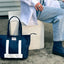 Blue wearsos tote bag with matching boots. 