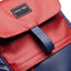 Wearsos Do Good upcycled backpack in red and navy blue textured eleather with a minimalist flap closure