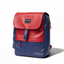 Wearsos Do Good upcycled backpack in red and navy blue with a minimalist flap design and branded front patch.
